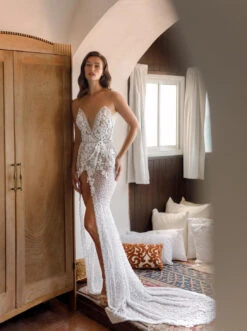 Ivory Sequinned & Beaded Tulle - Sensilla -Bridal Fabric Shop a strikingly designed bridal gown that features our stunning lace sensilla